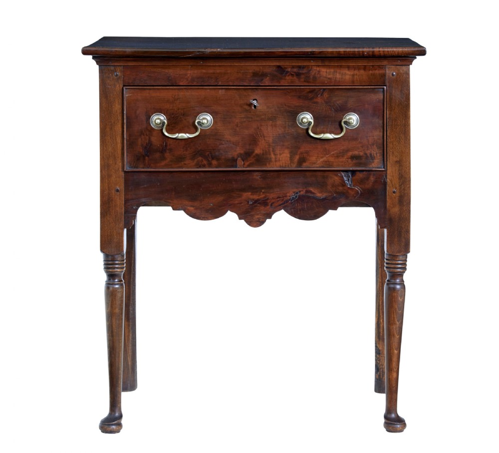 An 18th-century yew wood lowboy table featuring a single drawer with brass handles, a scalloped apron, and turned legs. View VII