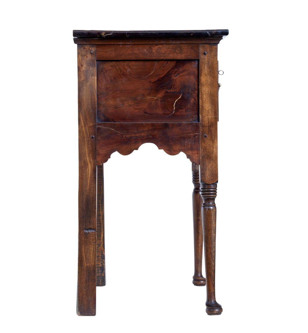 An 18th-century yew wood lowboy table featuring a single drawer with brass handles, a scalloped apron, and turned legs. View VIII