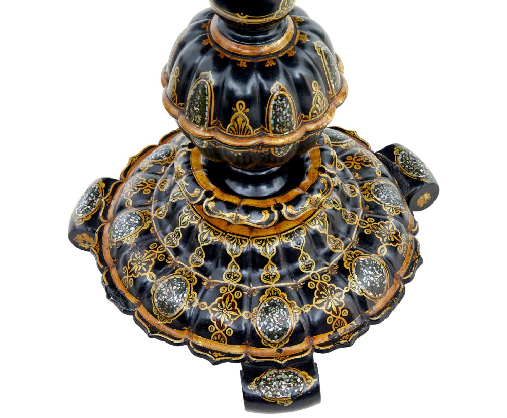 A 19th-century black lacquered papier-mache tilt-top table with a scalloped edge, hand-painted landscape, mother-of-pearl inlay, and gilded floral scrollwork on a turned pedestal. View III