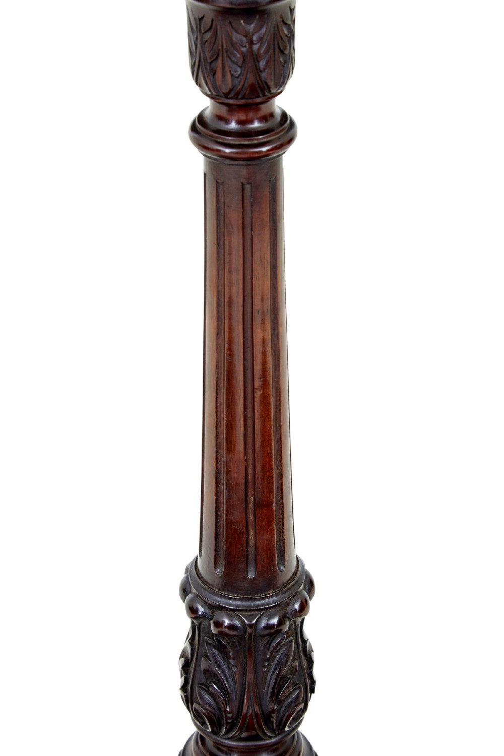 An early 20th-century carved mahogany torchere stand featuring a shaped top, a fluted column with acanthus leaf details, and a tripod base with pad feet. View VI
