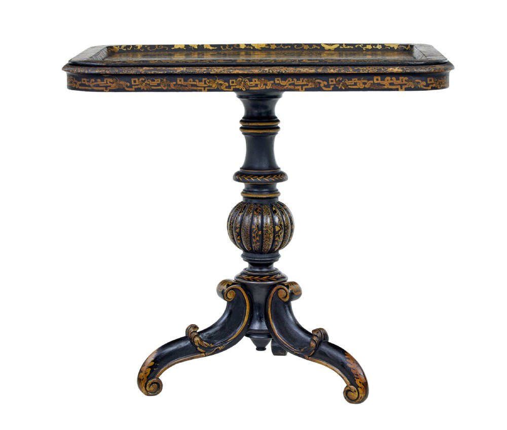 A 19th-century black lacquered pedestal table featuring hand-painted gold chinoiserie motifs, a tray top, turned central column, and tripod feet. View II