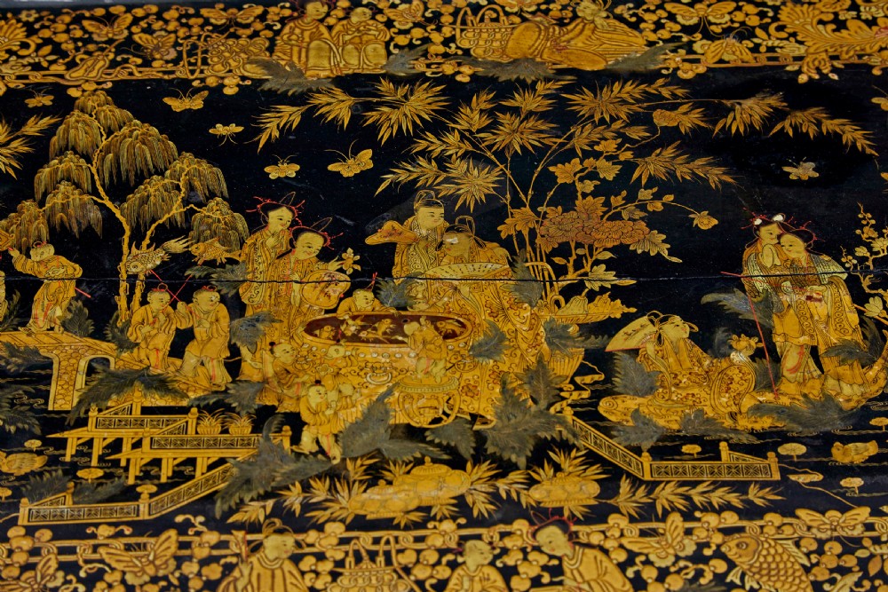 A 19th-century black lacquered pedestal table featuring hand-painted gold chinoiserie motifs, a tray top, turned central column, and tripod feet. View VIII