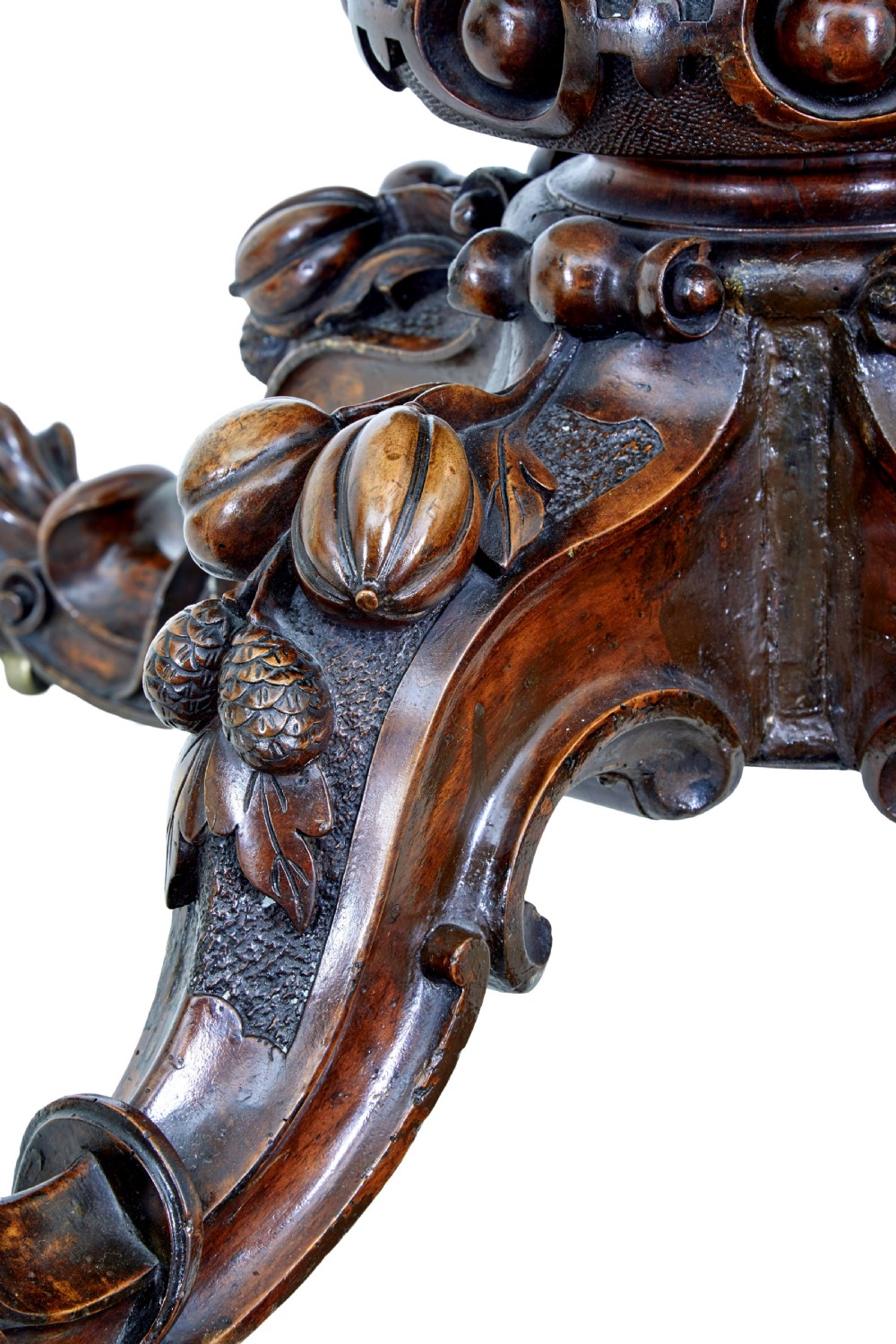 A 19th-century oval walnut tilt-top table with intricate floral marquetry inlay and a carved pedestal base with brass castors. View IX