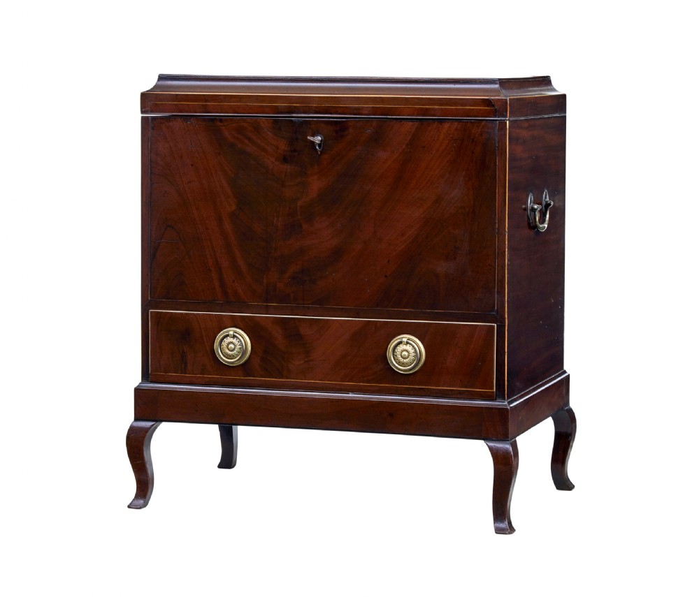 An Edwardian dark mahogany inlaid wine cooler featuring cabriole legs, brass rosette handles, boxwood stringing, and a hinged top lid.