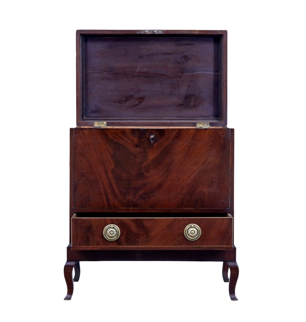 An Edwardian dark mahogany inlaid wine cooler featuring cabriole legs, brass rosette handles, boxwood stringing, and a hinged top lid. View III