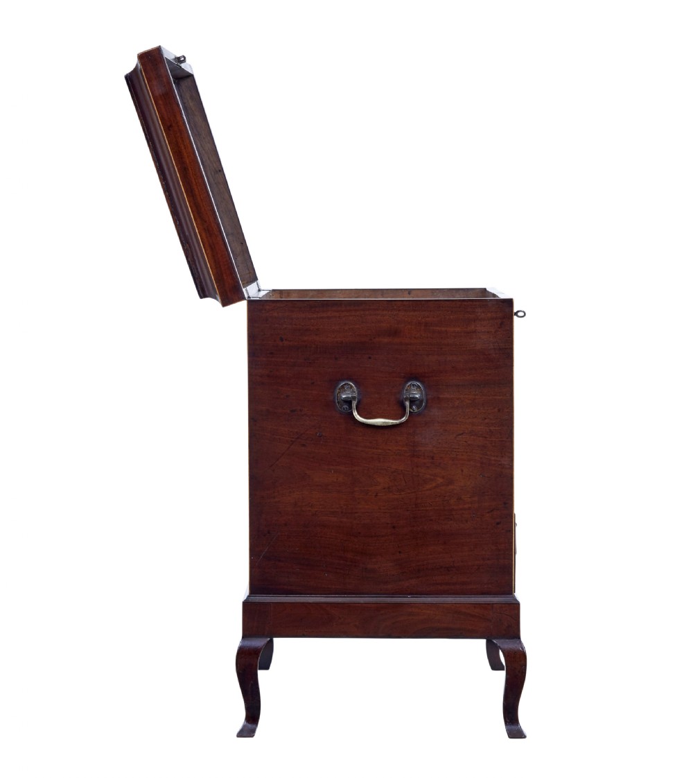 An Edwardian dark mahogany inlaid wine cooler featuring cabriole legs, brass rosette handles, boxwood stringing, and a hinged top lid. View VI