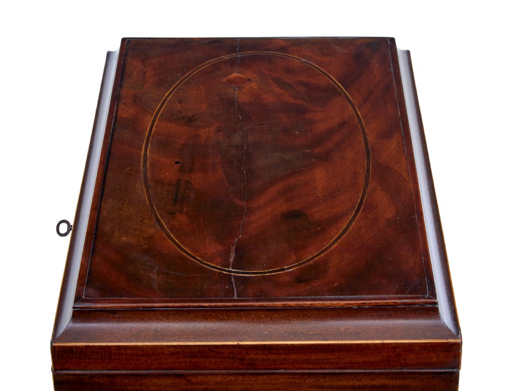 An Edwardian dark mahogany inlaid wine cooler featuring cabriole legs, brass rosette handles, boxwood stringing, and a hinged top lid. View VII
