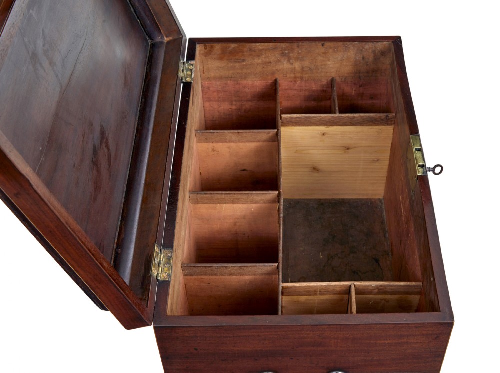 An Edwardian dark mahogany inlaid wine cooler featuring cabriole legs, brass rosette handles, boxwood stringing, and a hinged top lid. View IX