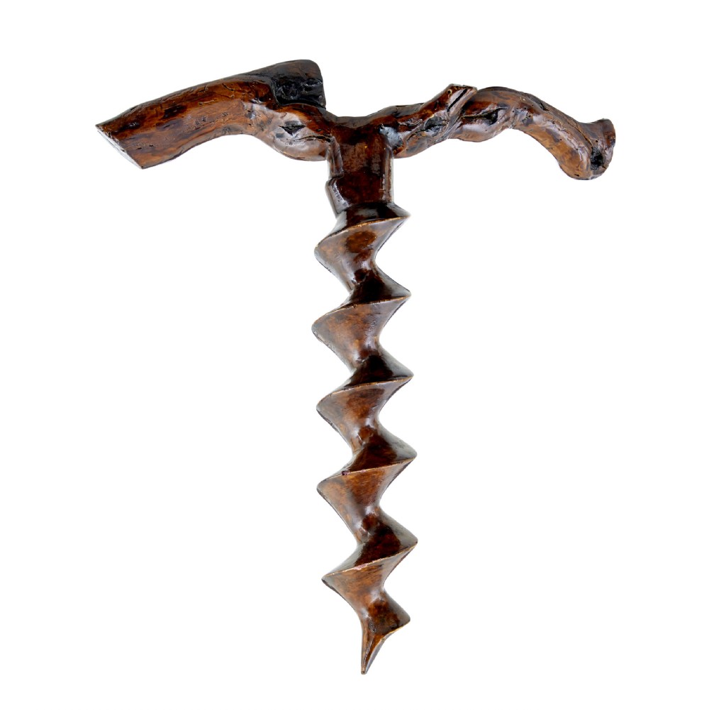 A hand-carved dark wood corkscrew featuring a carved spiral helix and an ergonomic, naturalistic wooden handle. View V