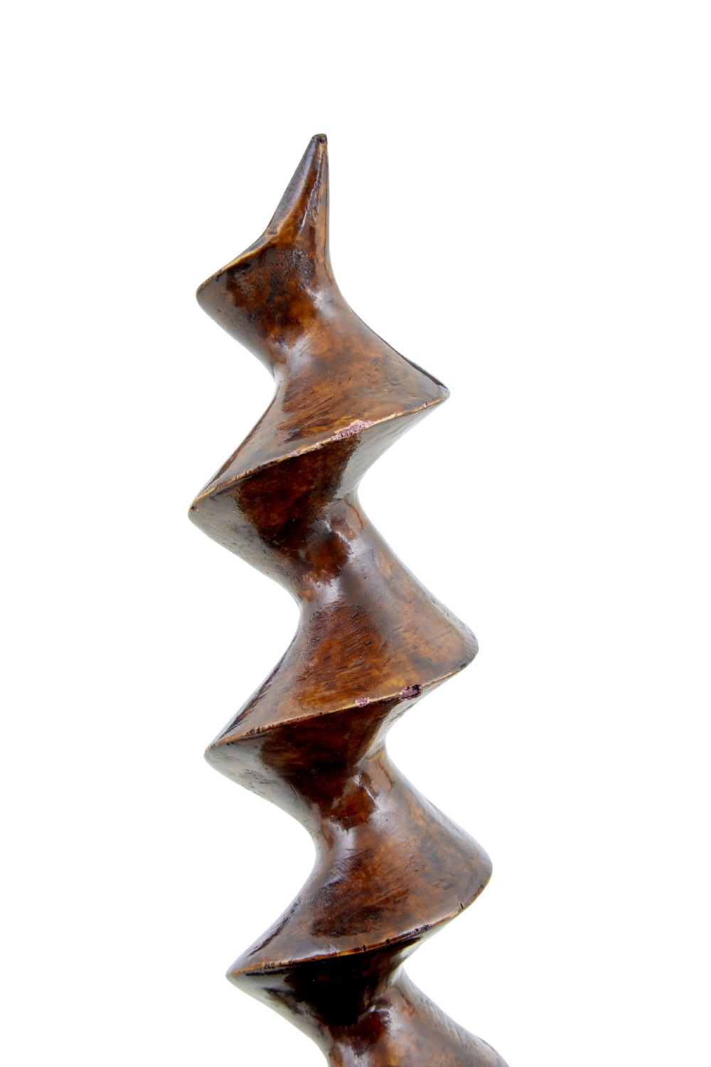 A hand-carved dark wood corkscrew featuring a carved spiral helix and an ergonomic, naturalistic wooden handle. View VI