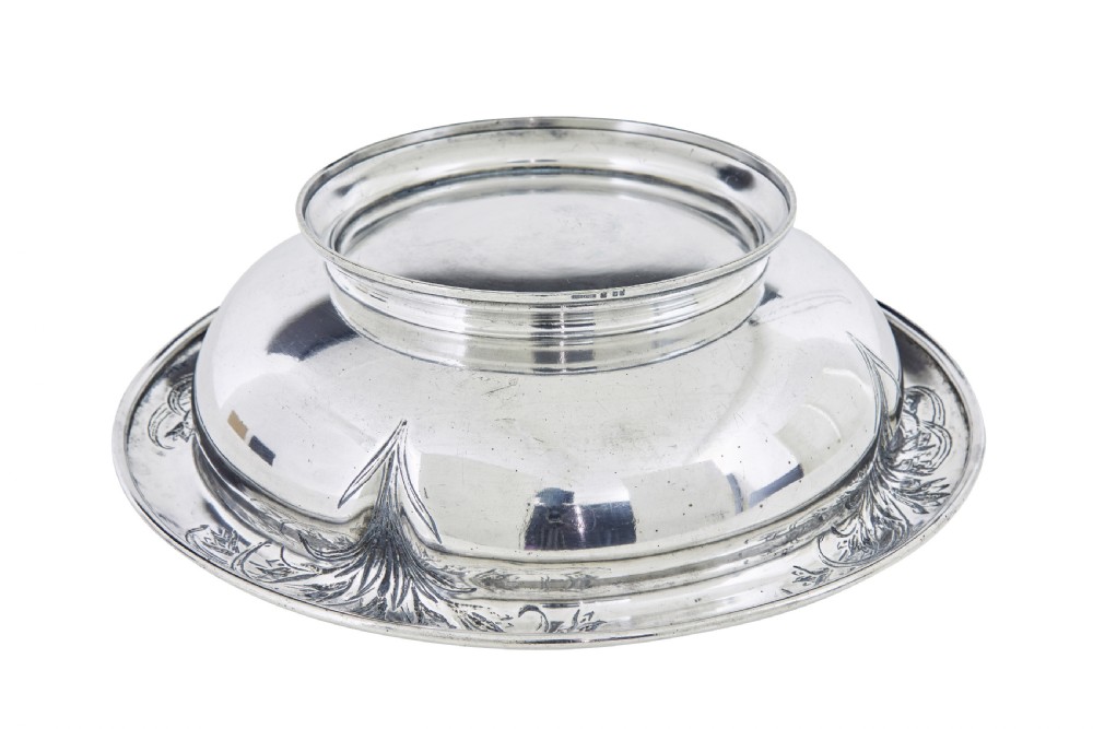 An Art Nouveau silver-plated ewer jug and matching basin set made by Christofle featuring relief-carved botanical foliage details. View VIII