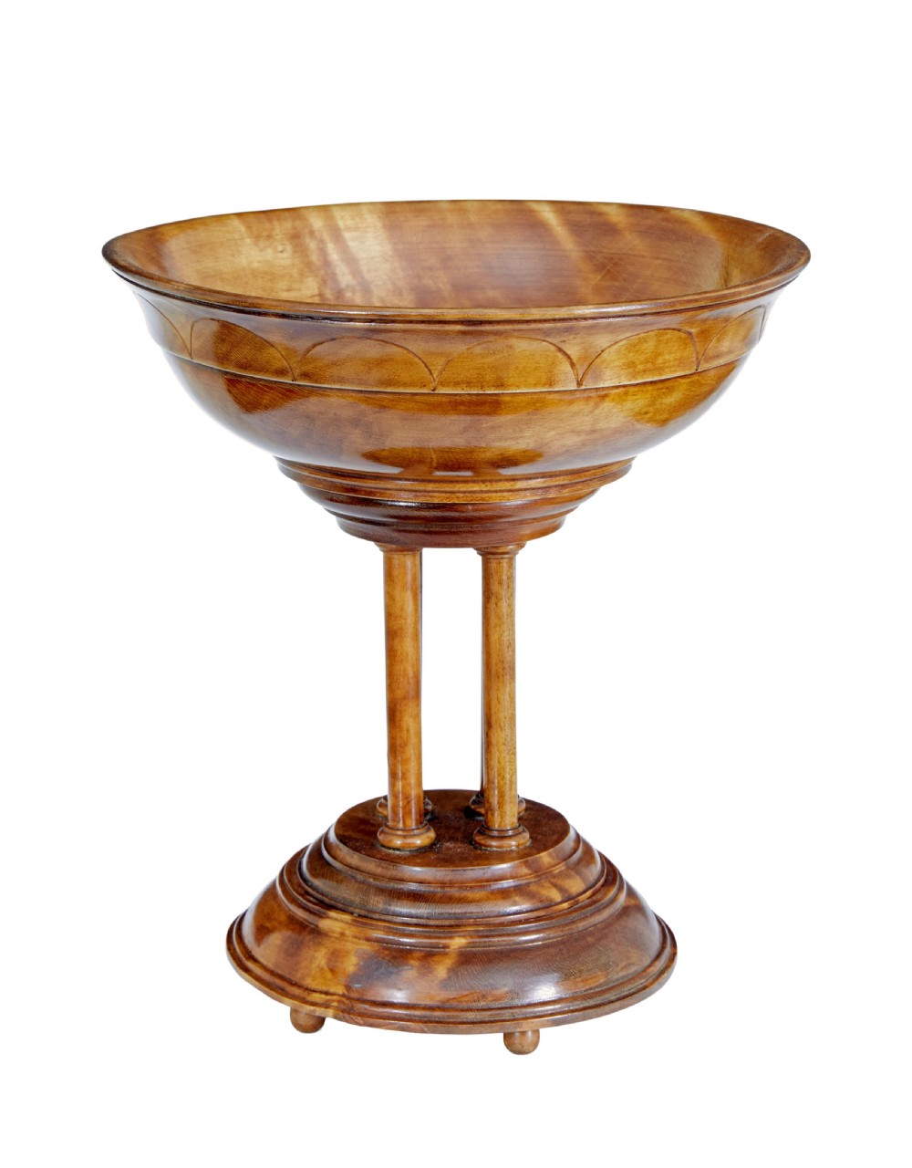 A 19th-century carved walnut tazza featuring a shallow turned bowl resting on slender columnar supports and a stepped circular base. View II
