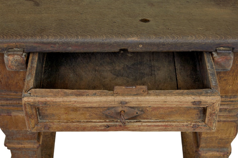 A 17th-century Flemish carved oak side table featuring a frieze drawer, turned legs, and a lower box stretcher. View III