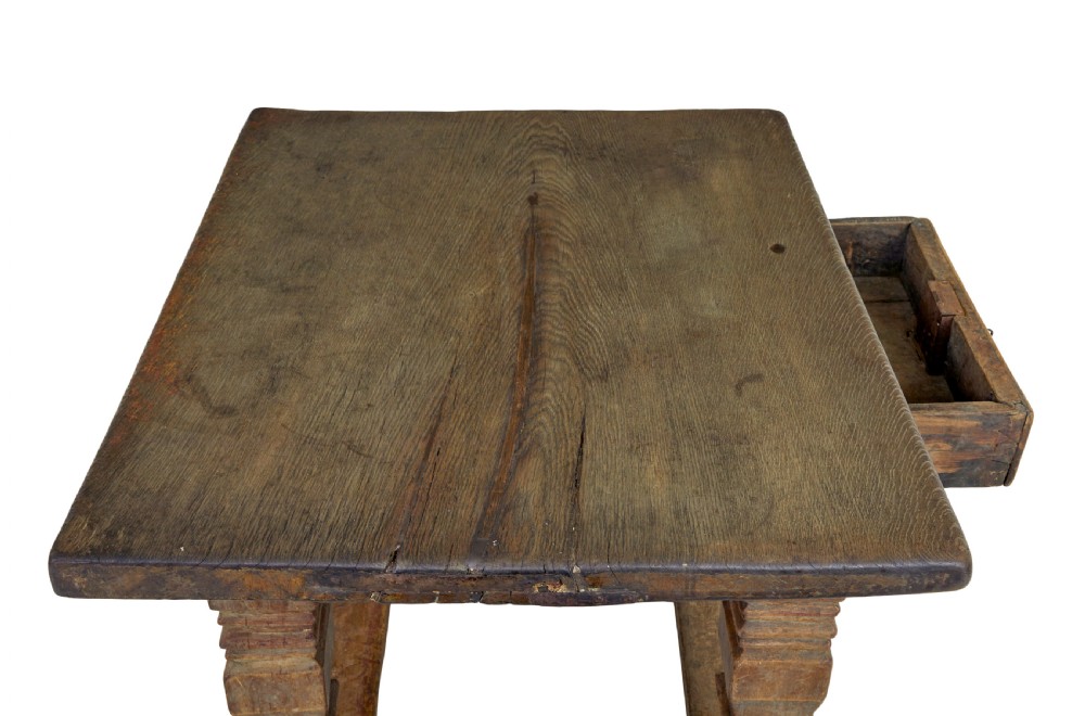 A 17th-century Flemish carved oak side table featuring a frieze drawer, turned legs, and a lower box stretcher. View IV