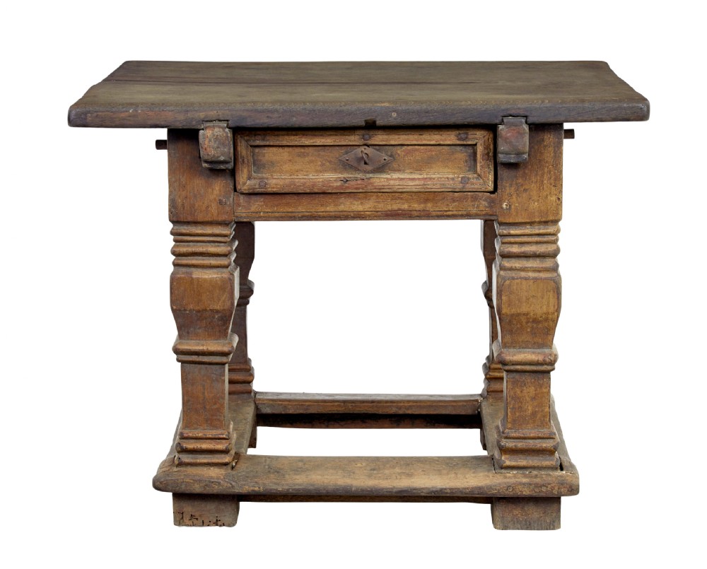 A 17th-century Flemish carved oak side table featuring a frieze drawer, turned legs, and a lower box stretcher. View VIII