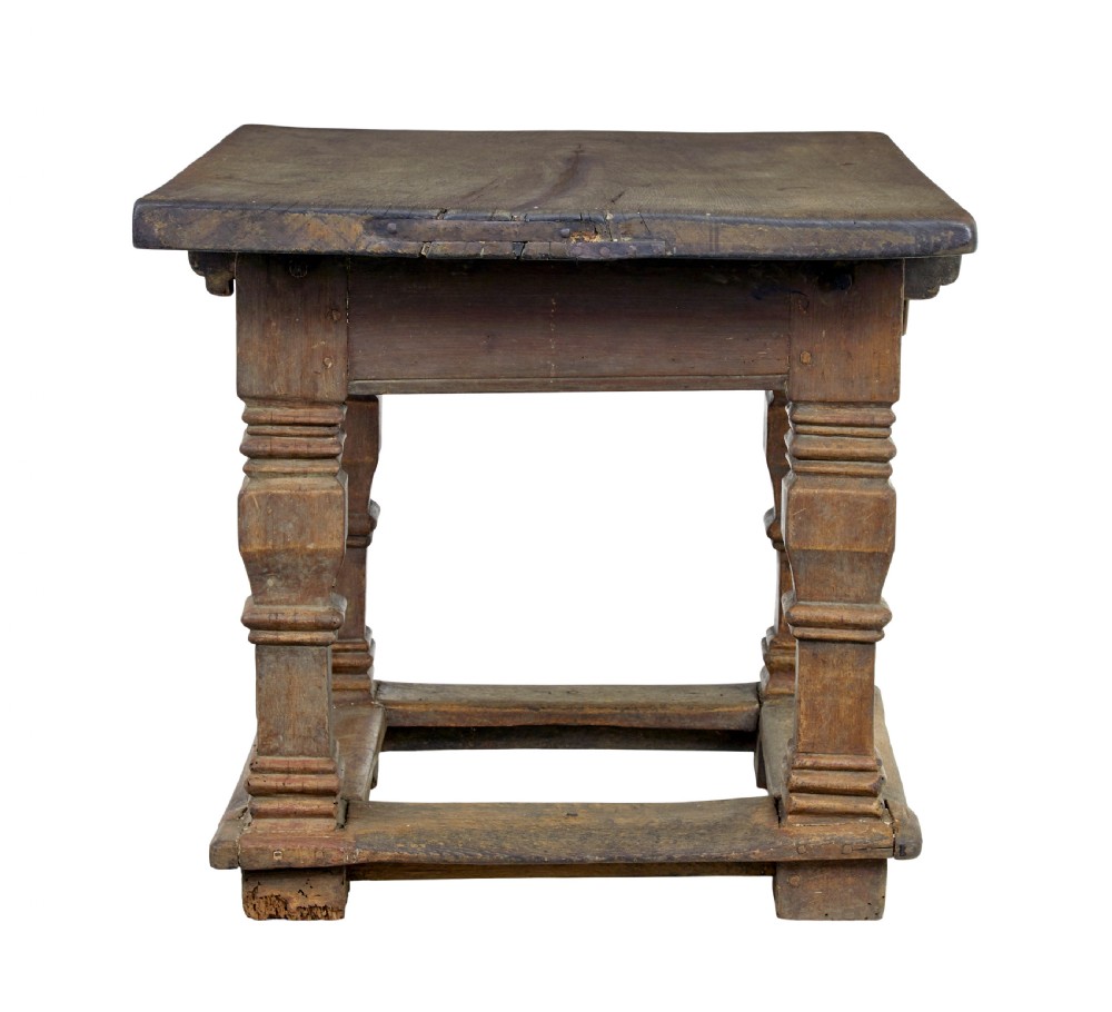 A 17th-century Flemish carved oak side table featuring a frieze drawer, turned legs, and a lower box stretcher. View IX