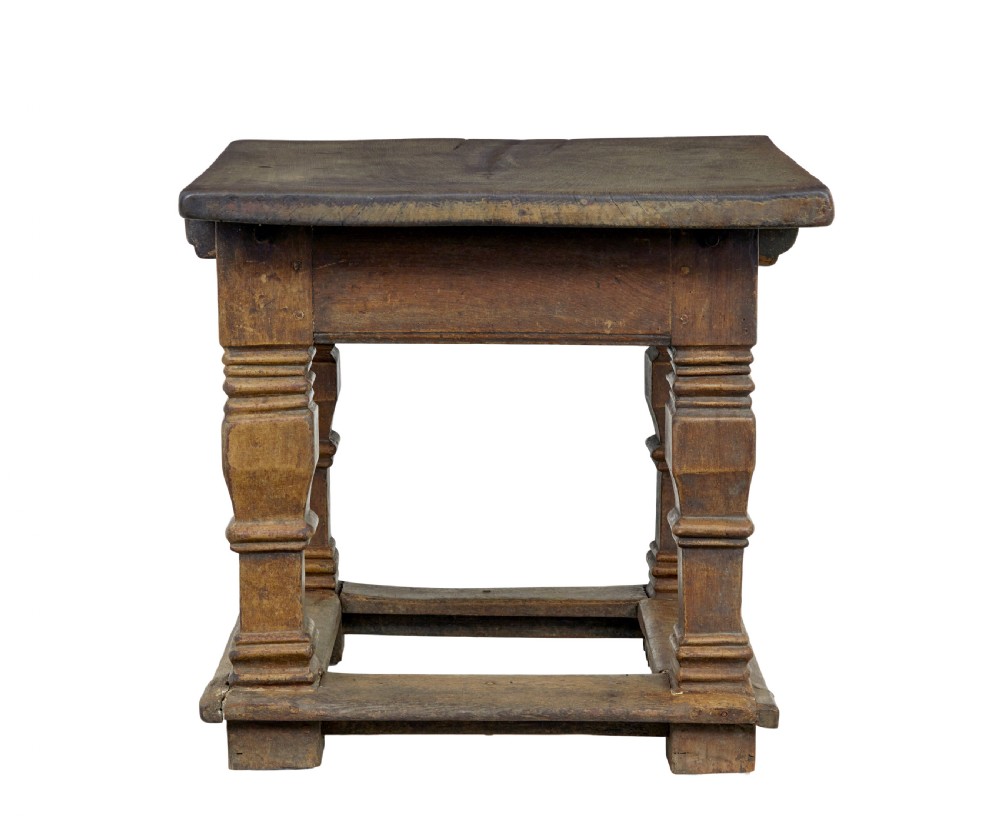 A 17th-century Flemish carved oak side table featuring a frieze drawer, turned legs, and a lower box stretcher. View XI