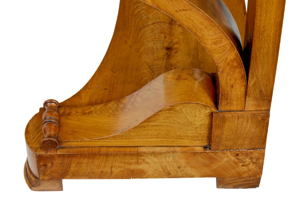 A mid-19th century Swedish console table made from light-coloured elm wood with a black marble top and curved s-scroll legs. View VIII