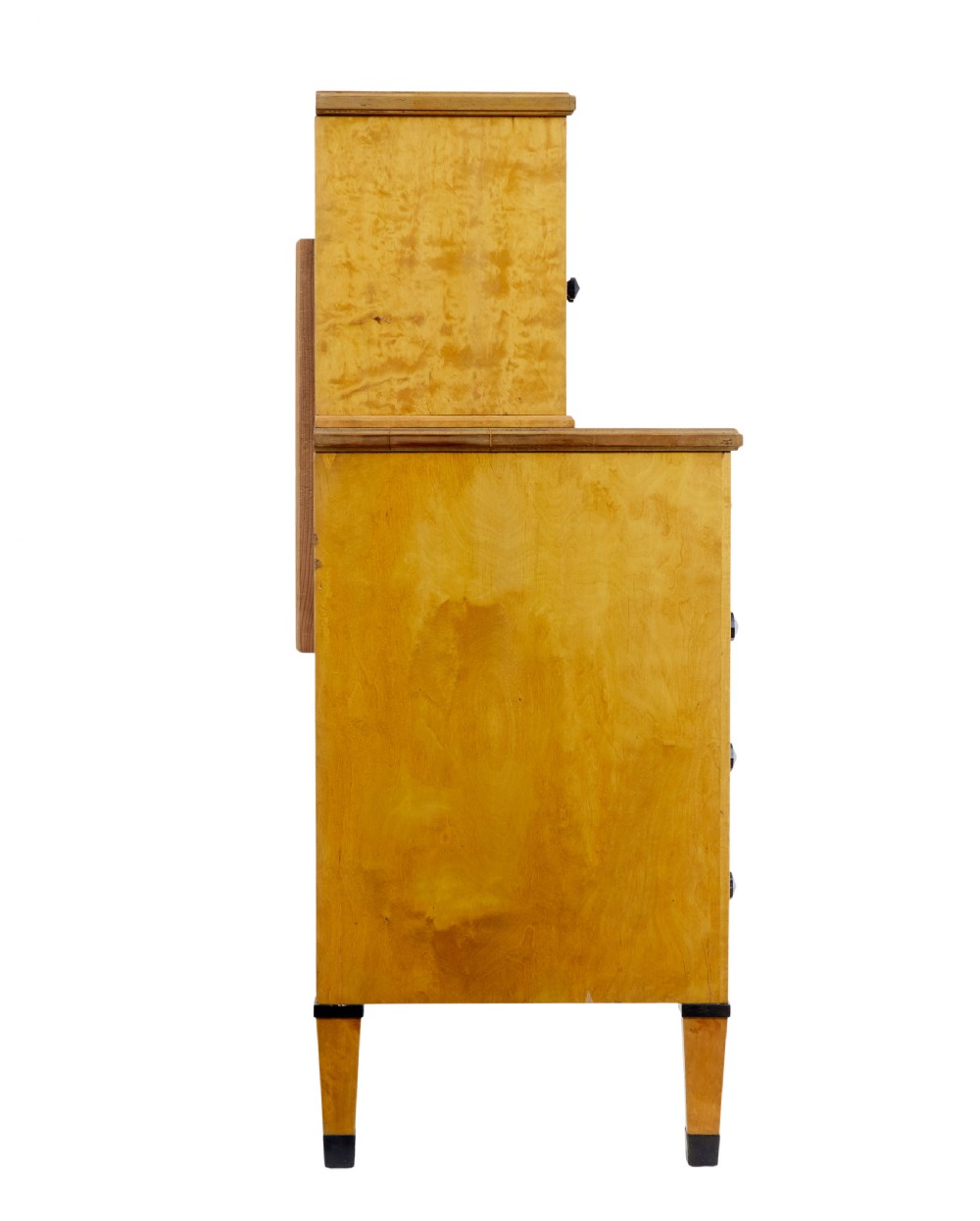 A late 19th-century Swedish satin birch cabinet featuring a three-door glazed top section with curved glazing bars resting on a five-drawer chest with dark faceted knobs. View VI