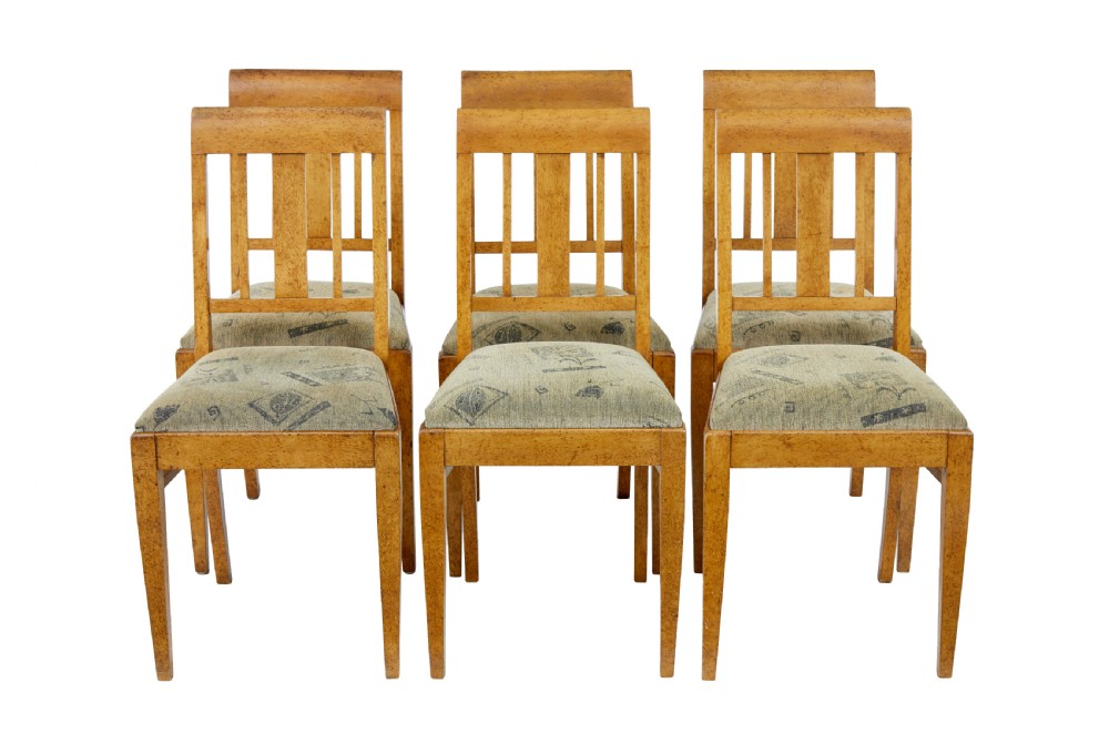 A seven-piece late nineteenth-century seating suite crafted from burr birch timber, including a high-backed sofa and six matching slat-back chairs with patterned fabric seats. View IX
