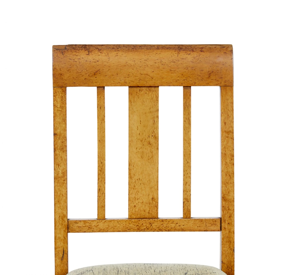 A seven-piece late nineteenth-century seating suite crafted from burr birch timber, including a high-backed sofa and six matching slat-back chairs with patterned fabric seats. View XIII