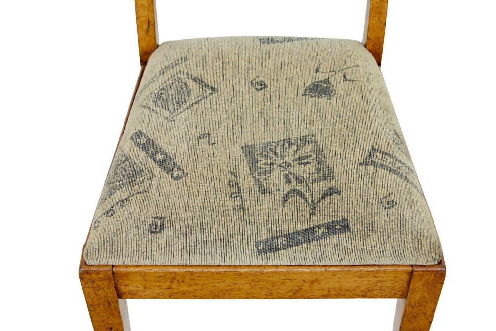 A seven-piece late nineteenth-century seating suite crafted from burr birch timber, including a high-backed sofa and six matching slat-back chairs with patterned fabric seats. View XIV