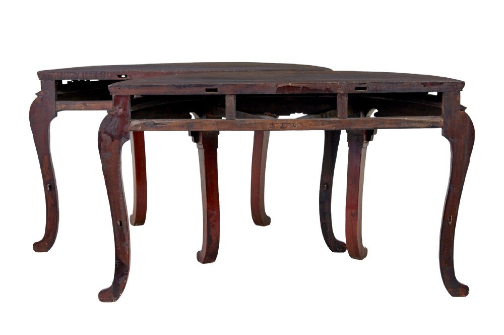 A pair of 19th-century Chinese red lacquer demi-lune tables joined together to form a circular table with carved key-fret aprons and cabriole legs. View IV