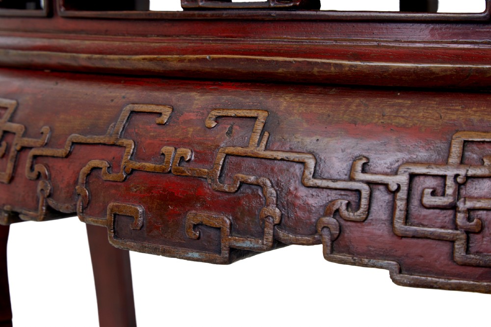 A pair of 19th-century Chinese red lacquer demi-lune tables joined together to form a circular table with carved key-fret aprons and cabriole legs. View IX