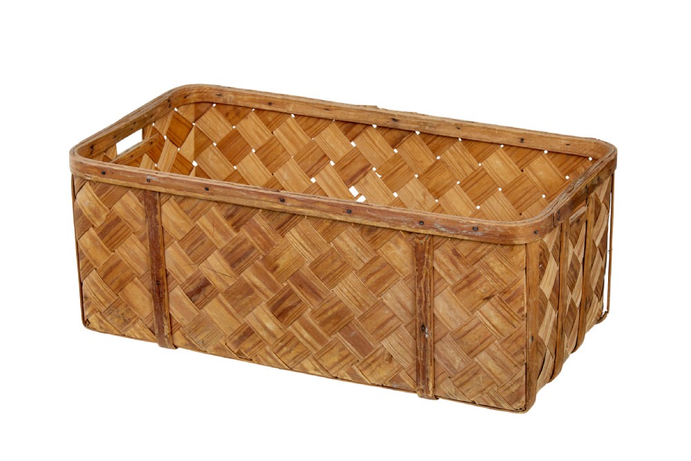 A rectangular Swedish pine splint basket featuring diagonal lattice weaving, reinforced top rim, and integrated handholds at the sides.