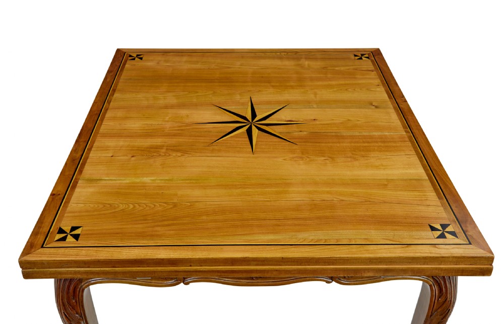 A 19th-century French fruitwood extending dining table with carved cabriole legs and a star inlay motif on the rectangular top. View VIII