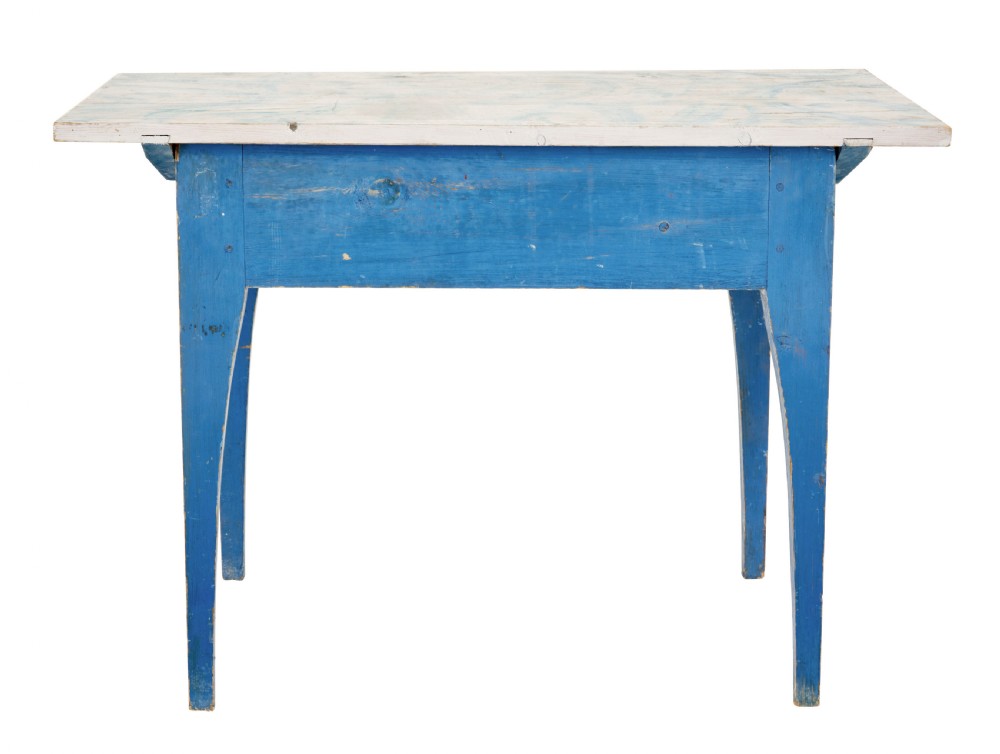 A 19th-century Swedish rustic side table with a blue painted frame, single frieze drawer, tapered square legs, and a worn white tabletop. View V