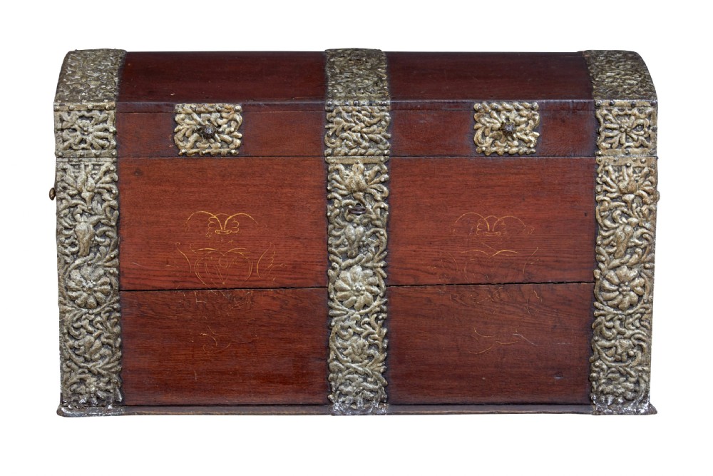 An 18th-century Danish dark oak dome-top coffer featuring intricate embossed brass straps, dual lock plates, and heavy side carrying handles. View II