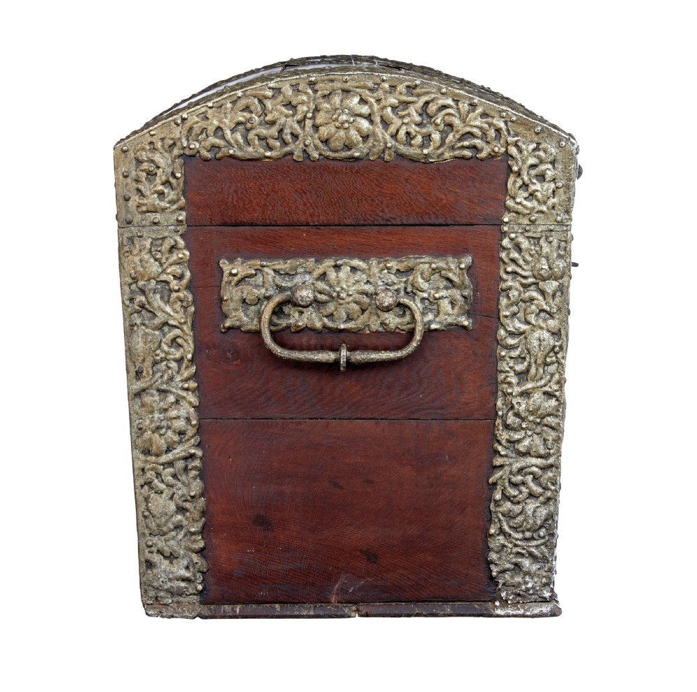 An 18th-century Danish dark oak dome-top coffer featuring intricate embossed brass straps, dual lock plates, and heavy side carrying handles. View III