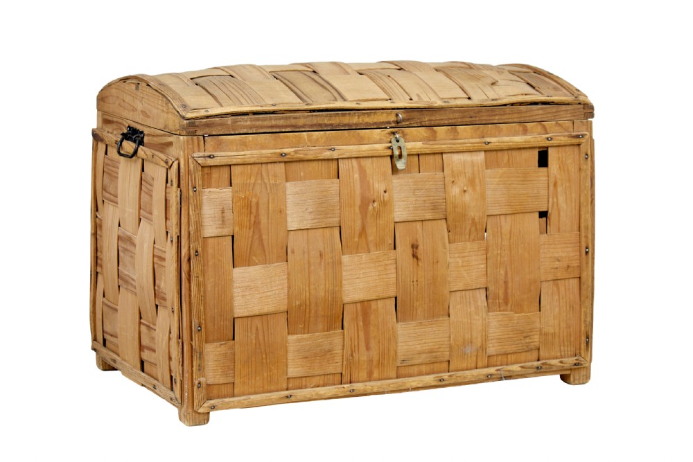 A late nineteenth-century Scandinavian trunk featuring woven pine strip construction, a domed lid, and iron side handles. View II
