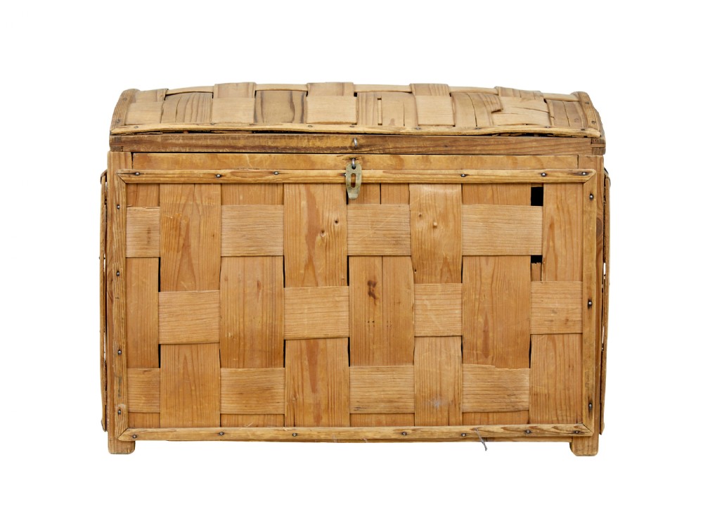 A late nineteenth-century Scandinavian trunk featuring woven pine strip construction, a domed lid, and iron side handles. View III