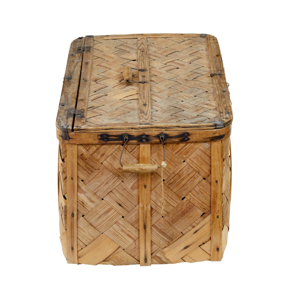 A 19th-century Swedish rectangular storage chest made from woven pine splints with a fitted hinged lid and wooden side handles. View III