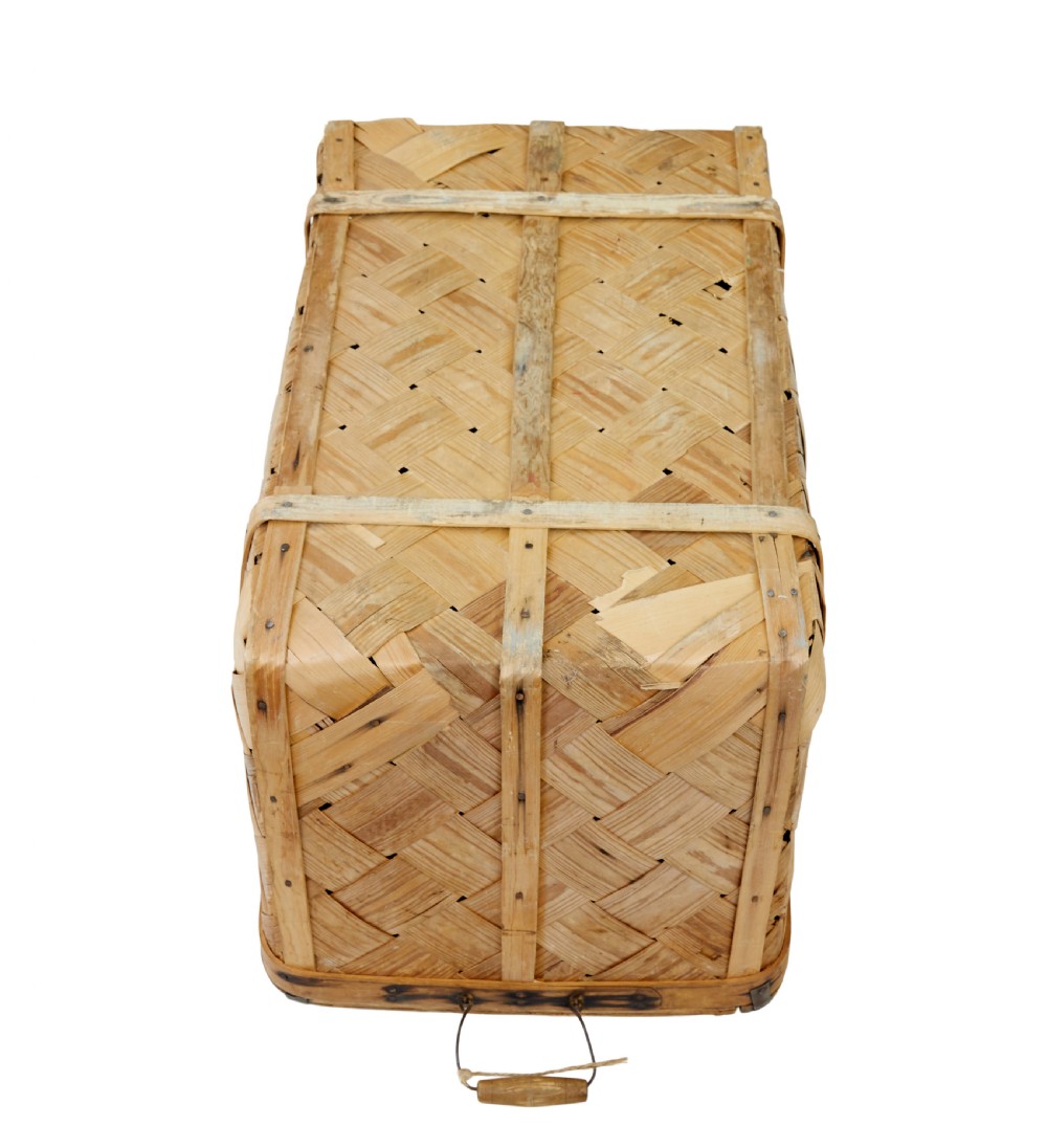 A 19th-century Swedish rectangular storage chest made from woven pine splints with a fitted hinged lid and wooden side handles. View VII