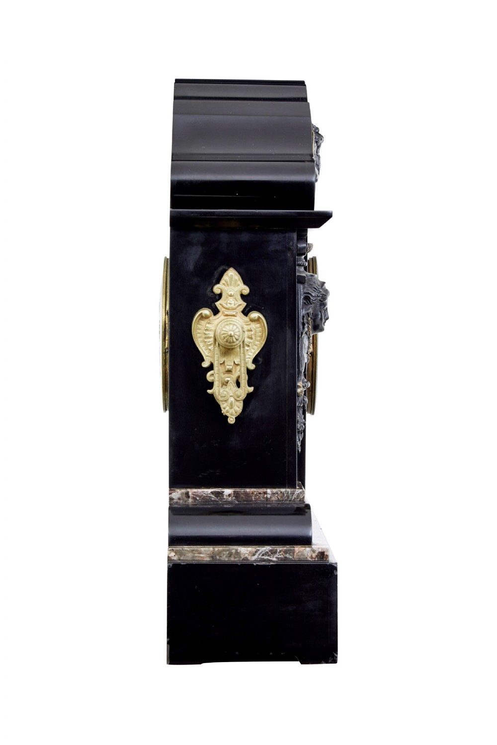 A High Victorian black marble mantel clock featuring gold incised scrollwork, a classical cherub relief panel, and a central circular dial with Roman numerals. View II