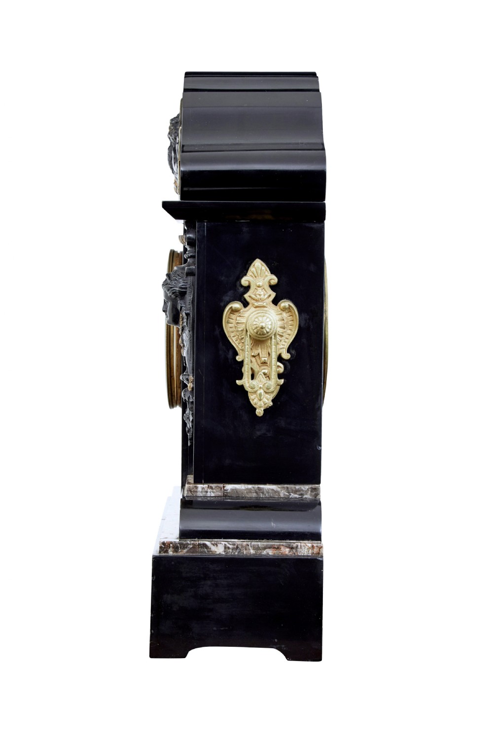 A High Victorian black marble mantel clock featuring gold incised scrollwork, a classical cherub relief panel, and a central circular dial with Roman numerals. View III