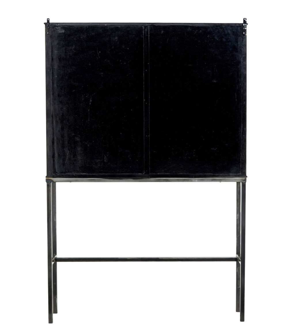 A 1920s French brass glazed display cabinet by Siegel resting on a tall dark steel base with adjustable internal glass shelves. View VI