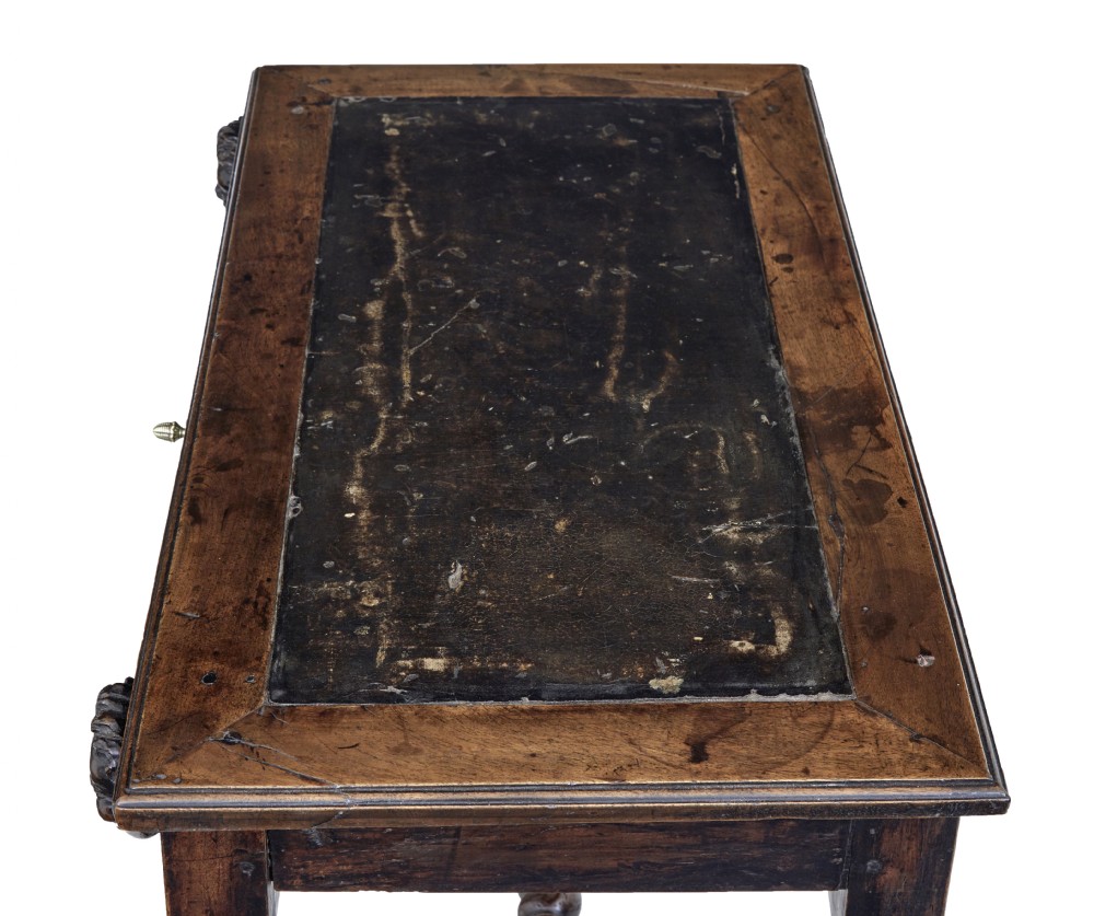 An early 19th-century Flemish carved walnut side table featuring barley twist legs, a carved frieze drawer with corner masks, and a low twist stretcher. View VI