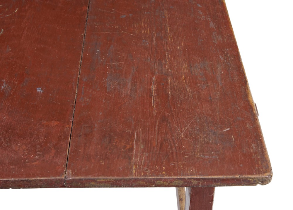 A large 19th-century Scandinavian pine table with a red-painted finish, rectangular plank top, and lower box stretcher. View IV