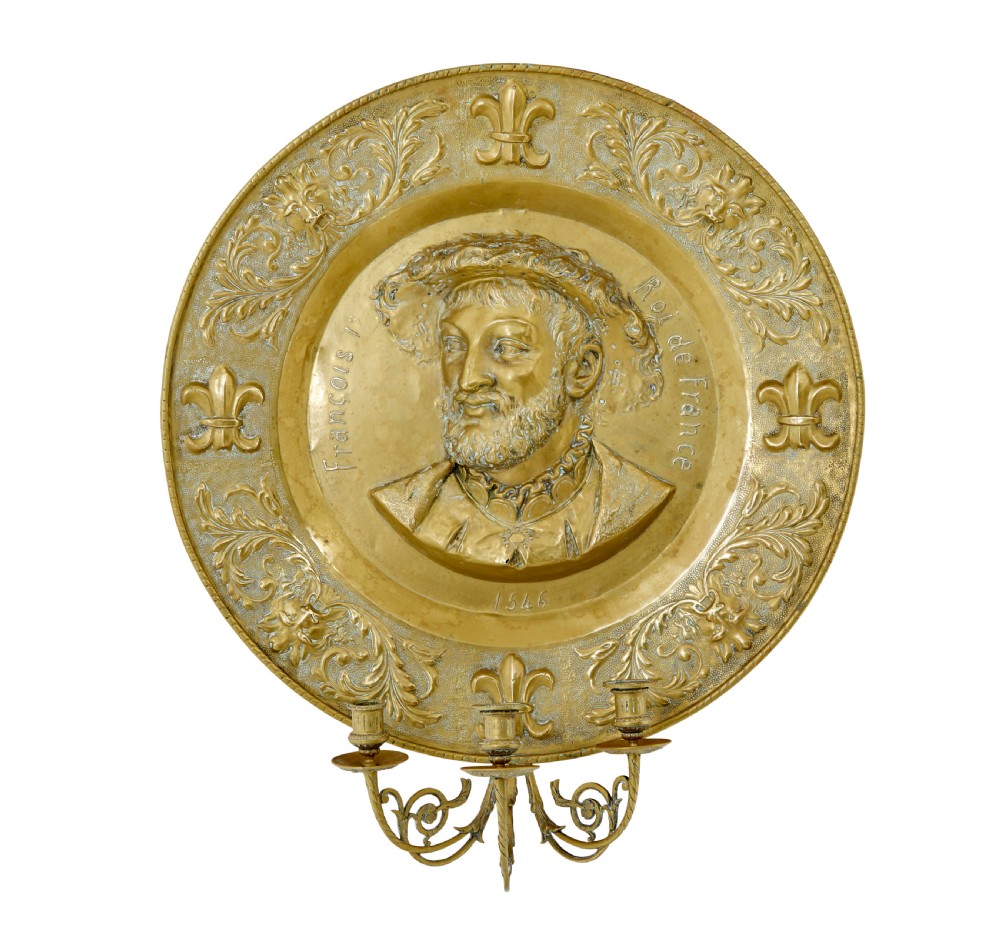 A pair of circular 19th-century French brass wall sconces featuring central relief portraits of Diane de Poitiers and King Francois I, adorned with fleur-de-lis motifs and three candle branches each. View II