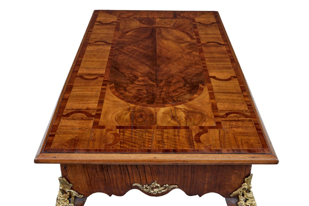 A 19th-century Rococo Revival walnut side table featuring inlaid marquetry on the top, curved cabriole legs, and ornate gilt-bronze ormolu mounts. View III