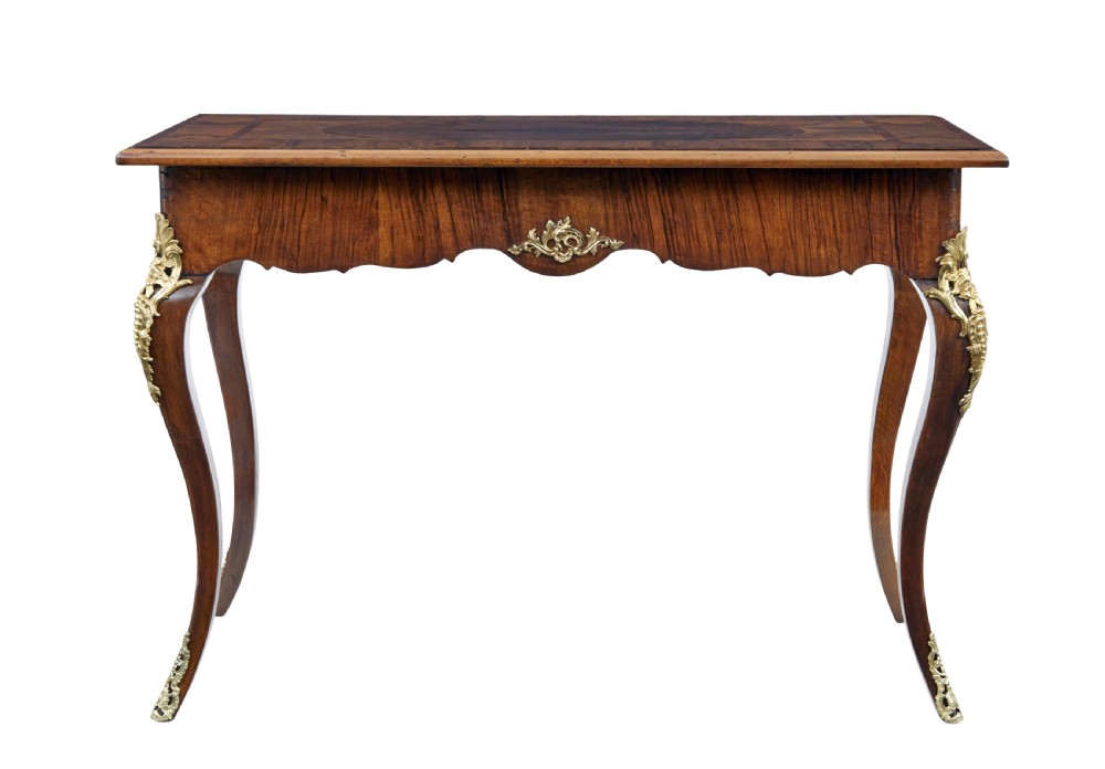A 19th-century Rococo Revival walnut side table featuring inlaid marquetry on the top, curved cabriole legs, and ornate gilt-bronze ormolu mounts. View VII