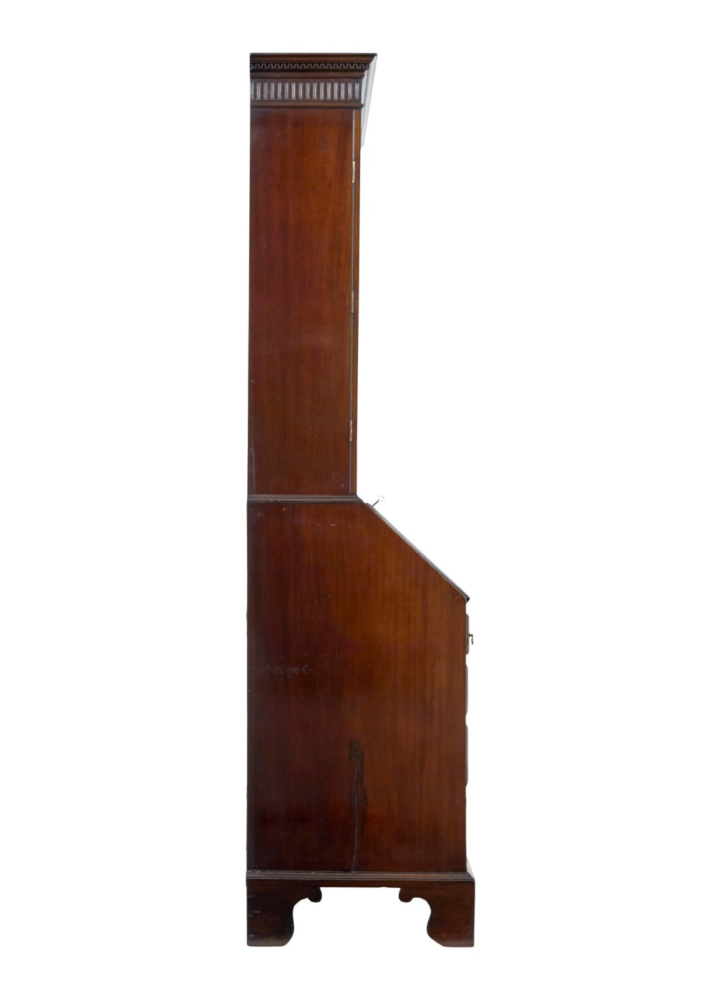 An early nineteenth-century mahogany bureau bookcase featuring upper astragal glazed doors, a slant fall-front writing section, and four graduated lower drawers. View VI