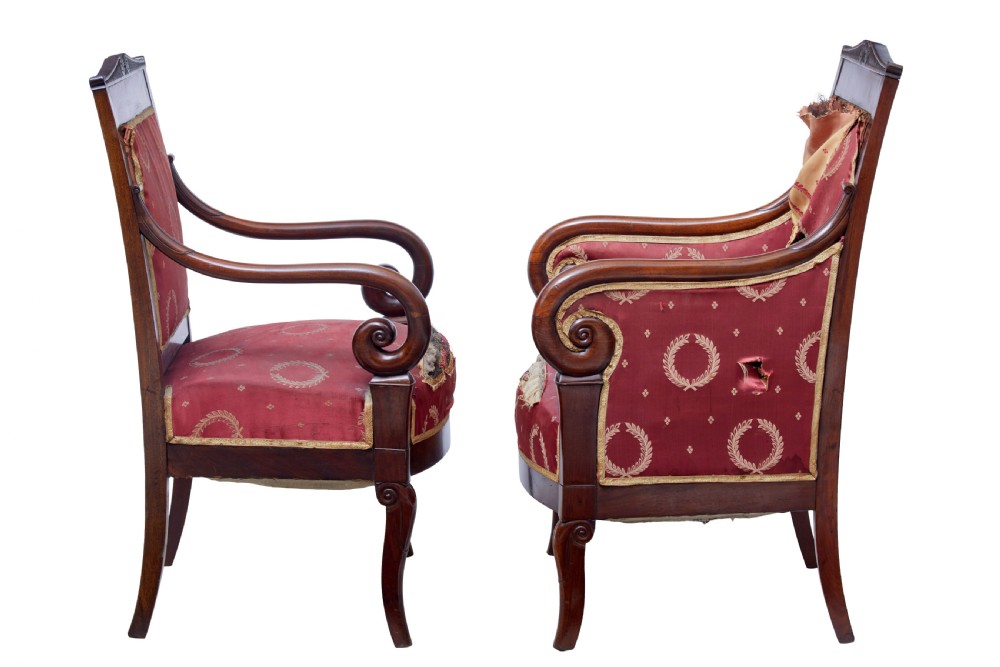 A set of four mid-19th-century Danish mahogany armchairs with scroll arms and red patterned fabric upholstery. View V
