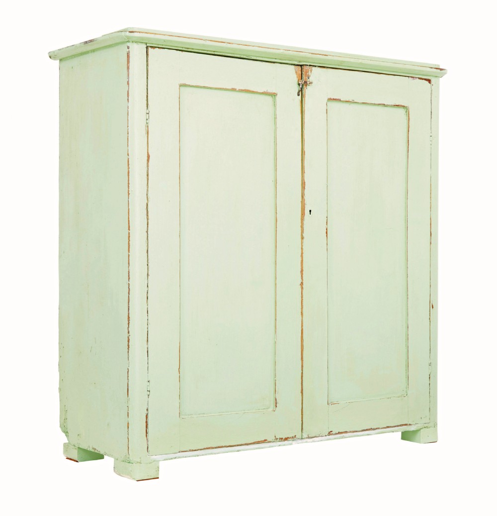 A mid-nineteenth-century Swedish pine cupboard featuring two recessed panel doors painted in distressed pale green with exposed iron hardware. View III