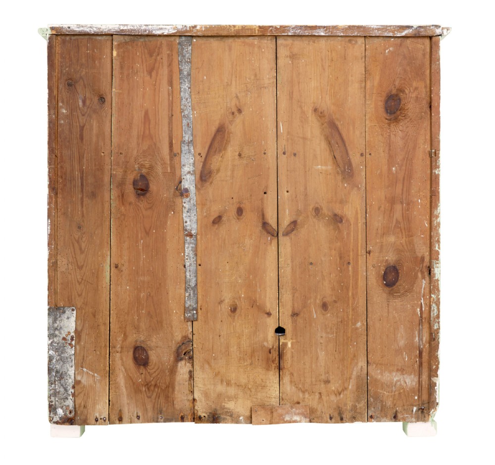 A mid-nineteenth-century Swedish pine cupboard featuring two recessed panel doors painted in distressed pale green with exposed iron hardware. View V