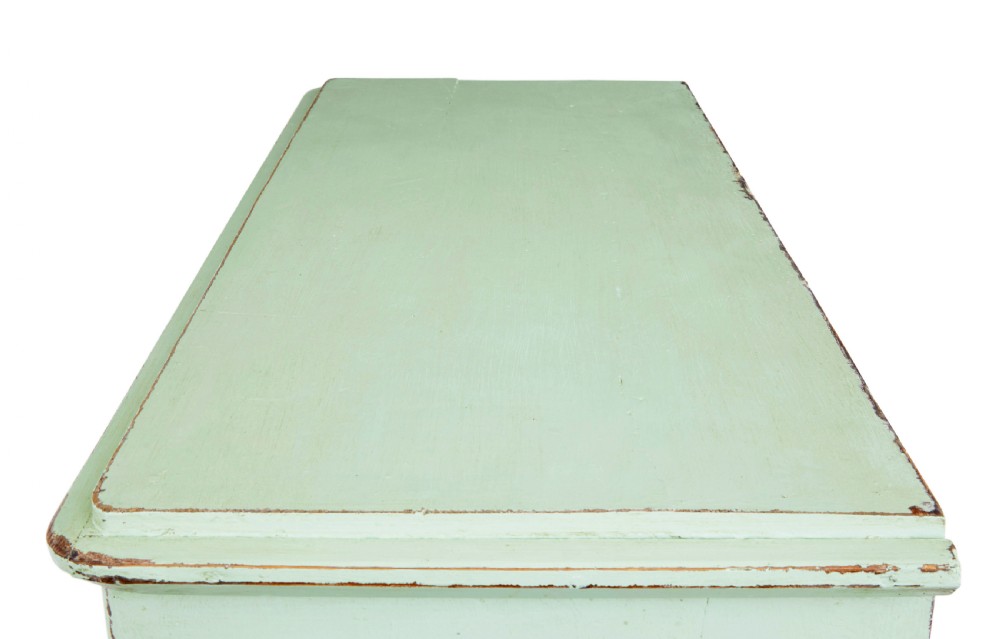 A mid-nineteenth-century Swedish pine cupboard featuring two recessed panel doors painted in distressed pale green with exposed iron hardware. View VI